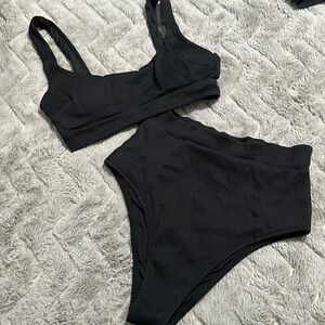 Aerie’s scoop swim top and high waisted cheeky swim bottom.